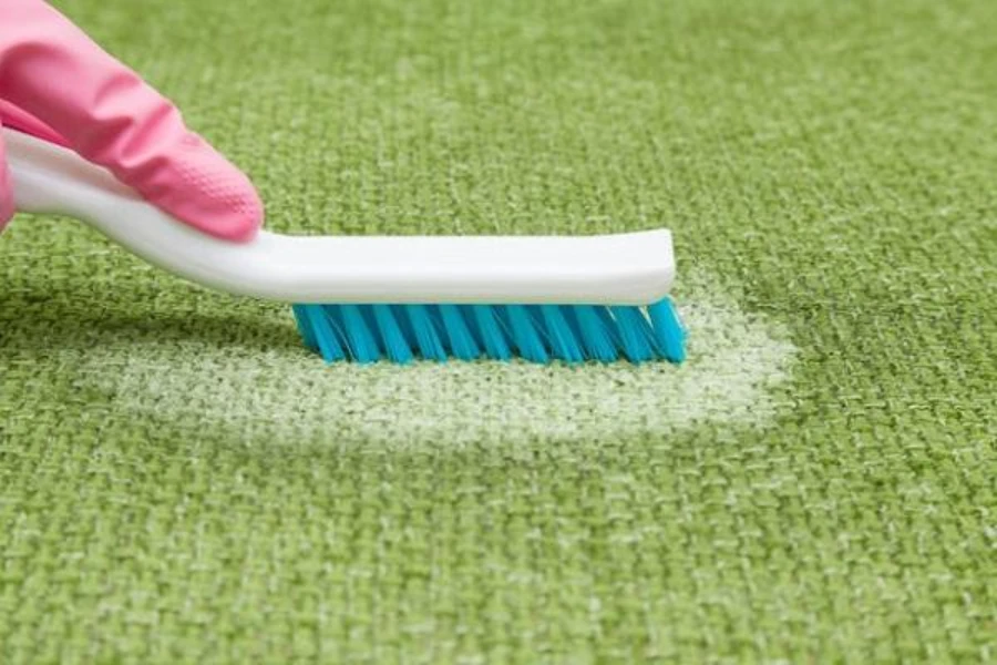 Use a brush to gently scrub the stain in a circular motion