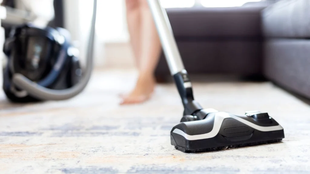 Vacuum the grease stain on the carpet